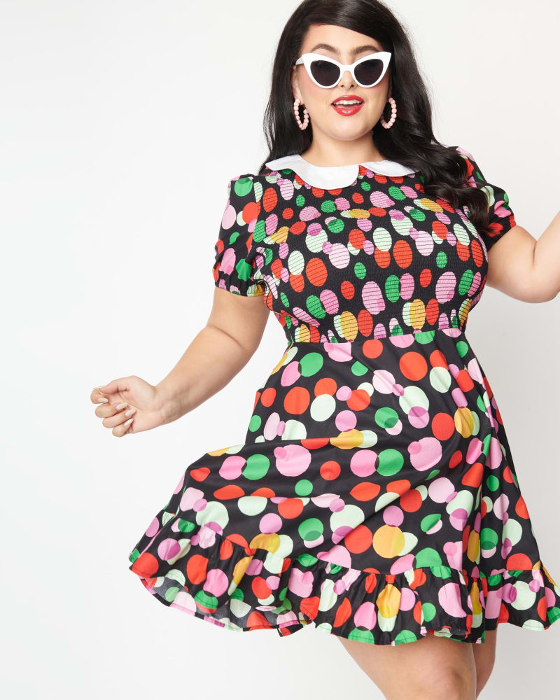 Front of a model wearing a size 2X Smak Parlour Black & Rainbow Dot Smocked Fit & Flare Dress in Black, Polka Dot by Smak Parlour. | dia_product_style_image_id:286980